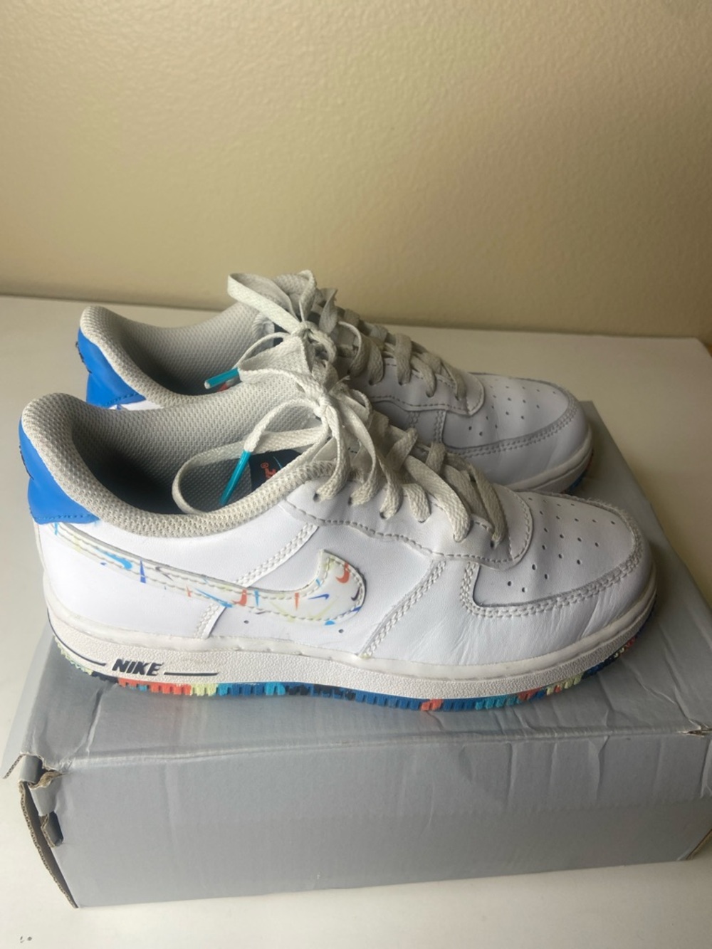 Nike White Leather Sneakers with Blue Heel and Multicolor Swoosh